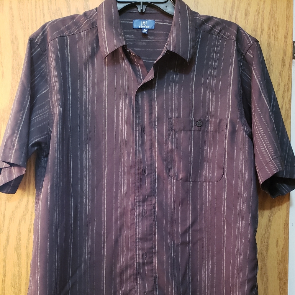 Men's short sleeve black/gray button up shirt with front pocket. Never worn